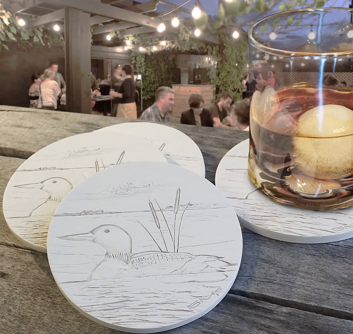 Loon Coasters, installed in a room