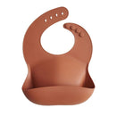 mushie Silicone Baby Bib | Adjustable Fit Waterproof Bibs (Clay) by TinyTreasures Baby Boutique