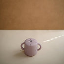mushie Silicone Snack Cup | Spill Proof Food Container for Toddler and Baby (Soft Lilac) by TinyTreasures Baby Boutique