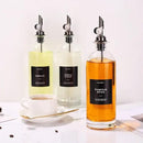 Molimoli Oil and Vinegar Dispenser with Metal Pour Spout, Weighted Pourer, Glass Bottle Dispenser for Kitchen, Olive Oil Cruet, Glass Olive Oil Bottle | 500ml, Set of 2 by CozyNest Decor