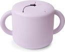 mushie Silicone Snack Cup | Spill Proof Food Container for Toddler and Baby (Soft Lilac) by TinyTreasures Baby Boutique