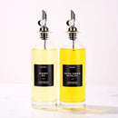 Molimoli Oil and Vinegar Dispenser with Metal Pour Spout, Weighted Pourer, Glass Bottle Dispenser for Kitchen, Olive Oil Cruet, Glass Olive Oil Bottle | 500ml, Set of 2 by CozyNest Decor