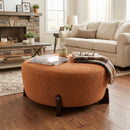 Modish Round Ottoman: Boucle Top with Splayed Rubber Wood Legs, Pumpkin