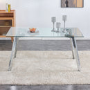 A modern minimalist rectangular glass dining table with tempered glass tabletop and silver metal legs, suitable for kitchens, restaurants, and living rooms,63"x35.4"x30"