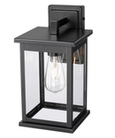 11"H Bowton II Outdoor Wall Light - Dusk to Dawn Matte Black Finish with Glass Shade by Millennium Lighting