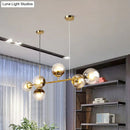 GobekUsa 6-Light Linear Dining Room Island Pendant with Postmodern Metallic Finish and Glass Ball Shades
