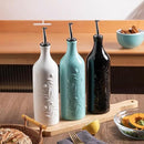 Sweejar Large Olive Oil Dispenser Bottle with Spout, 24 Oz Ceramic Oil Dispenser for Kitchen, Relief Opaque Oil Cruet, Oil Container for Cooking, EVOO, Avocado Oil, Vinegar, Pack of 1(Black) by CozyNest Decor