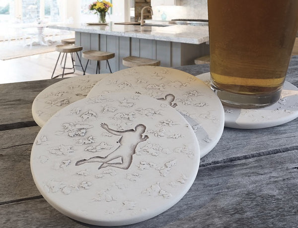 Skydiver Drink Coasters, installed in a room