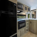RecPro 4.4 Cu Ft 12V RV Refrigerator with Freezer | Frost-Free, Black Finish | Adjustable Shelves, Reversible Door, Built-In Lock | Off-Grid Camper Fridge | 19.5”W x 23.5”D x 43.5”H by CozyNest Decor