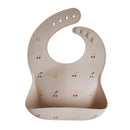 mushie Silicone Baby Bib | Adjustable Fit Waterproof Bibs (Cherries) by TinyTreasures Baby Boutique