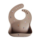 mushie Silicone Baby Bib | Adjustable Fit Waterproof Bibs (Rocket Ship) by TinyTreasures Baby Boutique