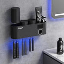 Toothbrush Sanitizer, Self Adhesive Toothbrush Holder with 3 Cups, Automatic Toothpaste Squeezer Dispenser Bathroom Accessories Set (Black) by CozyNest Decor