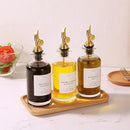 Molimoli Oil and Vinegar Dispenser with Metal Pour Spout, Weighted Pourer, Glass Bottle Dispenser for Kitchen, Olive Oil Cruet, Glass Olive Oil Bottle | 350ml, Set of 2 by CozyNest Decor