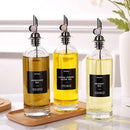 Molimoli Oil and Vinegar Dispenser with Metal Pour Spout, Weighted Pourer, Glass Bottle Dispenser for Kitchen, Olive Oil Cruet, Glass Olive Oil Bottle | 500ml, Set of 2 by CozyNest Decor