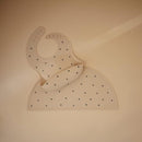 mushie Silicone Baby Bib | Adjustable Fit Waterproof Bibs (Black Daisy) by TinyTreasures Baby Boutique
