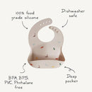 mushie Silicone Baby Bib | Adjustable Fit Waterproof Bibs (Bows) by TinyTreasures Baby Boutique