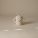 mushie x Bluey 100% Silicone Training Cup & Straw for Toddlers | 6 Months+ (Bluey Ivory) by TinyTreasures Baby Boutique
