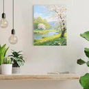The scenery of a stream between trees and cherry blossoms under the blue sky is suitable for posting in the living room bedroom office landscape posters by CozyNest Decor