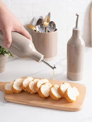 famiware Milkyway 16oz Ceramic Olive Oil Dispenser Bottle, Olive Oil and Vinegar Dispenser Bottle Set of 2 with Stainless Steel Pourers, Suitable for Storage Vinegar, Liquids, White and Cinnamon Brown by CozyNest Decor