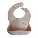 mushie Silicone Baby Bib | Adjustable Fit Waterproof Bibs (Vanilla Confetti) by TinyTreasures Baby Boutique