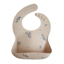 mushie Silicone Baby Bib | Adjustable Fit Waterproof Bibs (Lilac Flowers) by TinyTreasures Baby Boutique