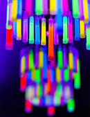 Glow Fever Glow Sticks Bulk 200ct Premium Glow in The Dark Light Up with Lanyards, for Party Supplies, Party Favors, Birthday, Halloween, Super Bright, Lasts Up to 12 hrs by TinyTreasures Baby Boutique