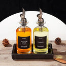 Molimoli Oil and Vinegar Dispenser with Metal Pour Spout, Weighted Pourer, Glass Bottle Dispenser for Kitchen w. Ceramic Tray|Black, 350ml, Set of 2 by CozyNest Decor