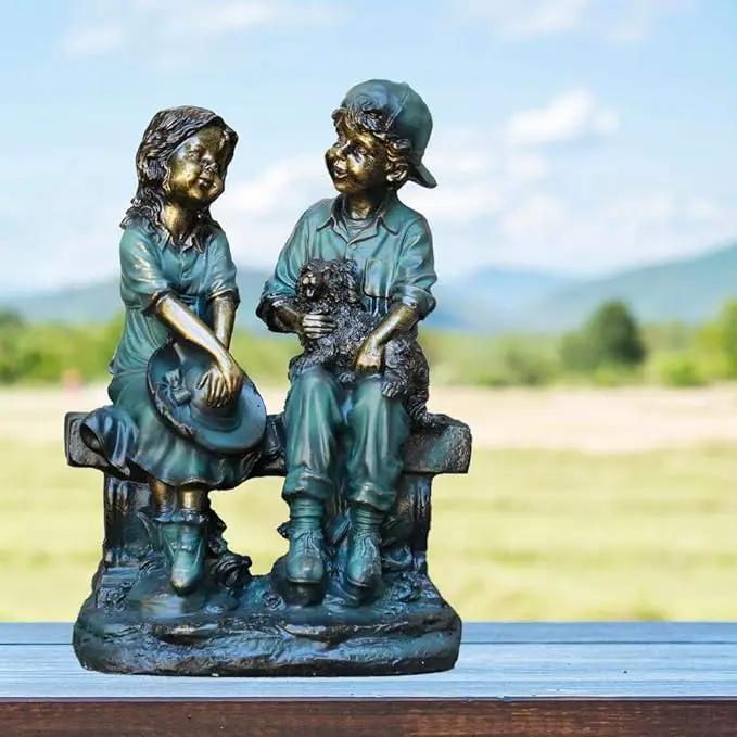 Alpine Corporation 16" Tall Indoor/Outdoor Girl and Boy Sitting on Bench with Puppy Statue Yard Art Decoration, photo 2 of 7