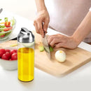 Aelga Olive Oil Dispenser Bottle - Glass Oil Dispenser - Dispenser Bottle for Kitchen with Stainless Steel Spout by CozyNest Decor