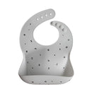 mushie Silicone Baby Bib | Adjustable Fit Waterproof Bibs (Letters White) by TinyTreasures Baby Boutique