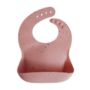 mushie Silicone Baby Bib | Adjustable Fit Waterproof Bibs (Powder Pink Confetti) by TinyTreasures Baby Boutique