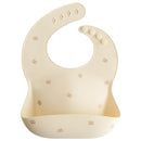 mushie Silicone Baby Bib | Adjustable Fit Waterproof Bibs (Pretzel) by TinyTreasures Baby Boutique