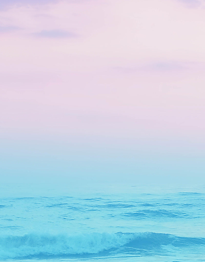 Pastel Color Sunset over the Ocean Horizon Wall Mural. Beach Theme Peel and Stick Wallpaper.