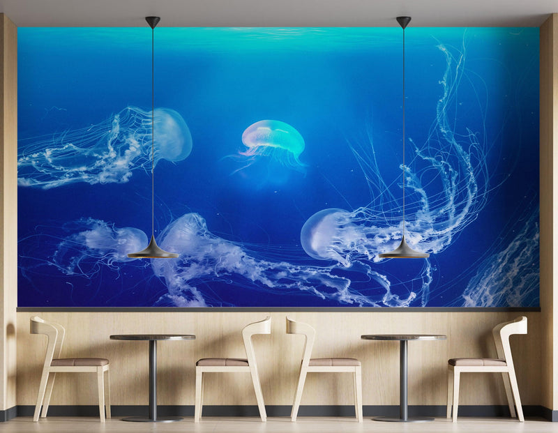 Jellyfish Floating Underwater Wall Mural. Deep Blue Ocean Peel and Stick Wallpaper.