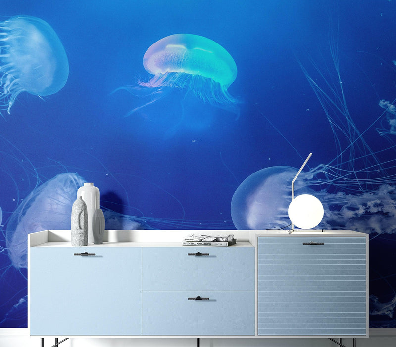 Jellyfish Floating Underwater Wall Mural. Deep Blue Ocean Peel and Stick Wallpaper.