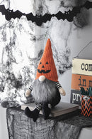 23.5" Seated Jack-O'-Lantern Gnome With Striped Limbs and Faux Fur Beard