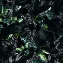 Tropical Leaves In a Dark Jungle Background Wallpaper
