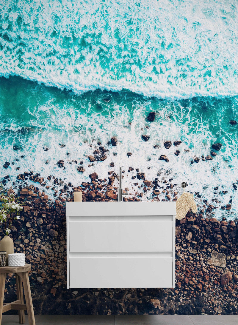 Ocean Waves over Cliff Wallpaper. Rocky Beach Wall Mural. Bright Aqua Color Beach Waves.