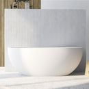 67 in. x 31 in. Oval Freestanding Solid Surface Soaking Bathtub with Center Drain in Matte by HouseOfZazla