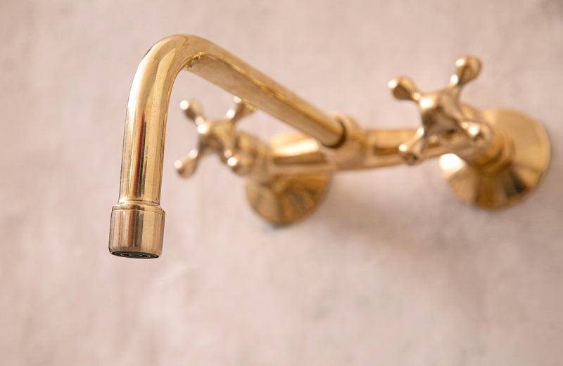 Timeless Unlacquered Brass Wall-Mounted Faucet with Elegant Cross Handles - BRASSMA