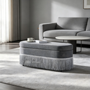 Oval Upholstered Storage Ottoman with Fringe Trim