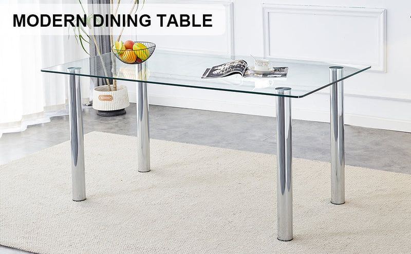 A modern minimalist style glass dining table. Transparent tempered glass tabletop with a thickness of 0.3 feet and silver metal legs. Suitable for restaurants and living rooms. 63 "x 35.4" x 30"
