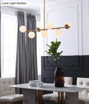 GobekUsa 7-Light Modern Gold Metal Island Pendant with Spherical White Glass - Ideal for Dining Table