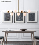 GobekUsa 7-Light Modern Gold Metal Island Pendant with Spherical White Glass - Ideal for Dining Table
