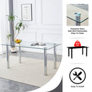 A modern minimalist style glass dining table. Transparent tempered glass tabletop with a thickness of 0.3 feet and silver metal legs. Suitable for restaurants and living rooms. 63 "x 35.4" x 30"