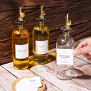 Molimoli Oil and Vinegar Dispenser with Metal Pour Spout, Weighted Pourer, Glass Bottle Dispenser for Kitchen, Olive Oil Cruet, Glass Olive Oil Bottle | 500ml, Set of 2 by CozyNest Decor