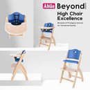 Abiie Beyond Junior Wooden High Chair with Tray - Adjustable and Convertible High Chair for Babies and Toddlers - 6 Months to 250 Lb - Water Resistant - Natural Wood/Blueberry Cushion by TinyTreasures Baby Boutique
