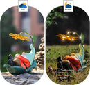 Solar Powered Gnome Garden Statue - Resin Gnome on Green Leaf with Large Yellow Stamen Sunshade, LED Lights Decorations, for Women Men, Outdoor Decor Ornaments for Outside by GreenHaven Gardens
