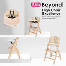 Abiie Beyond Junior Wooden High Chair with Tray - Adjustable and Convertible High Chair for Babies and Toddlers - 6 Months to 250 Lb - Water Resistant - Natural Wood with Beige Cushion by TinyTreasures Baby Boutique
