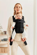 BabyBjörn Baby Carrier Mini, Black, Woven | Newborn Carrier (7-25 lbs), Ergonomic, Easy-to-Use by TinyTreasures Baby Boutique